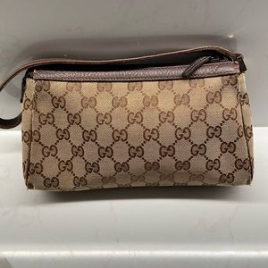 Gucci GG logo fabric with leather handle bag.  8x6